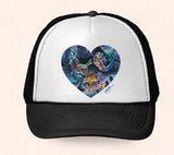 Black and white Hawaii trucker hat featuring Tom Thordarson's artwork of a diver and a mermaid.