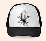 Black and white Hawaii trucker hat featuring Tom Thordarson's black and white artwork of a tropical parrot sitting on crossbones.